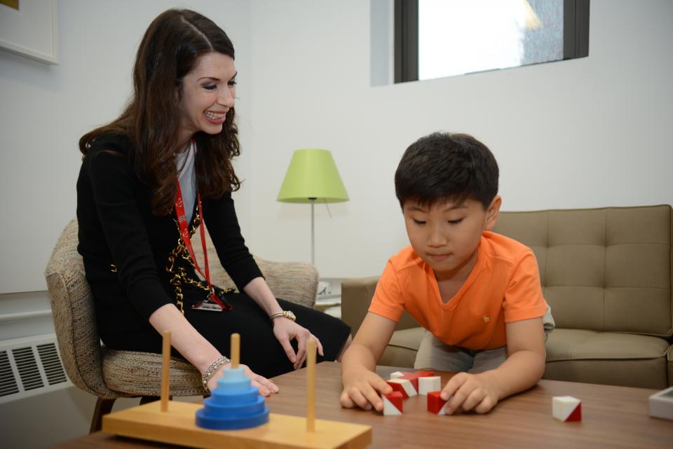 female psychiatrist with a child patient