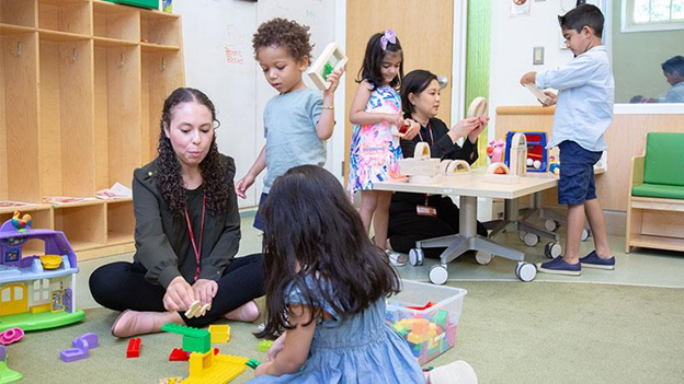 Autistic children playing with toys during session